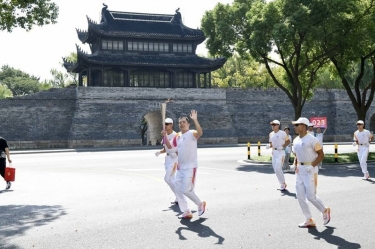 笑容与热情刷屏！这名火炬手是NG电子游戏人！